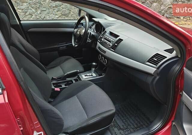 Червоний Міцубісі Lancer, об'ємом двигуна 2 л та пробігом 187 тис. км за 5500 $, фото 22 на Automoto.ua