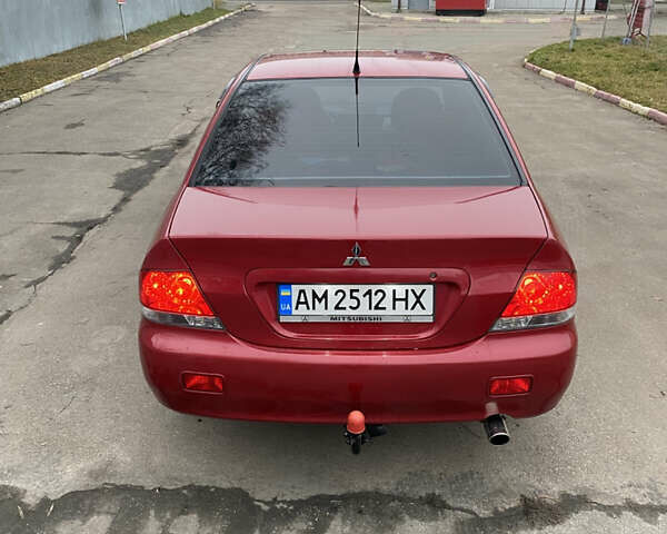 Червоний Міцубісі Lancer, об'ємом двигуна 1.58 л та пробігом 151 тис. км за 5600 $, фото 6 на Automoto.ua