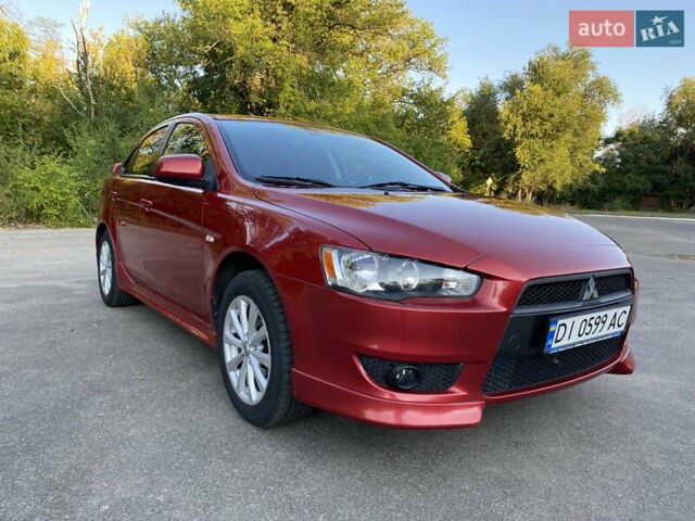 Червоний Міцубісі Lancer, об'ємом двигуна 2 л та пробігом 153 тис. км за 6700 $, фото 11 на Automoto.ua