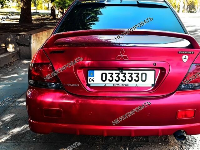 Красный Мицубиси Лансер, объемом двигателя 0 л и пробегом 252 тыс. км за 5400 $, фото 6 на Automoto.ua