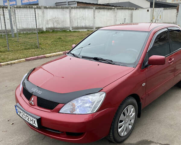 Червоний Міцубісі Lancer, об'ємом двигуна 1.58 л та пробігом 151 тис. км за 5600 $, фото 2 на Automoto.ua