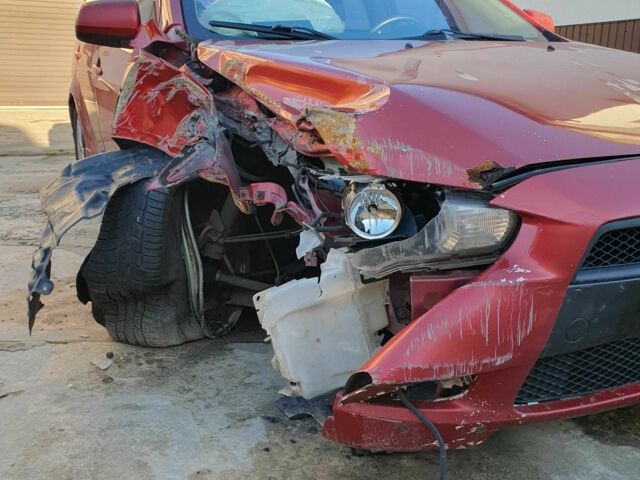 Красный Мицубиси Лансер, объемом двигателя 2 л и пробегом 406 тыс. км за 2750 $, фото 8 на Automoto.ua