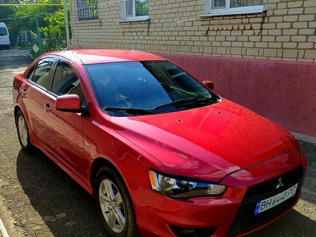 Червоний Міцубісі Lancer, об'ємом двигуна 2 л та пробігом 1 тис. км за 7200 $, фото 1 на Automoto.ua