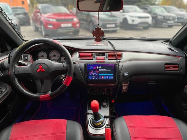 Мицубиси Лансер 2007 в Кривом Роге на Automoto.ua Красный Мицубиси Лансер, объемом двигателя 1.6 л и пробегом 252 тыс. км за 5400 $, фото 9 на Automoto.ua