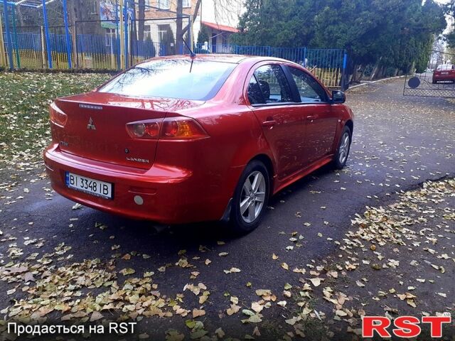 Червоний Міцубісі Lancer, об'ємом двигуна 2 л та пробігом 175 тис. км за 6750 $, фото 2 на Automoto.ua