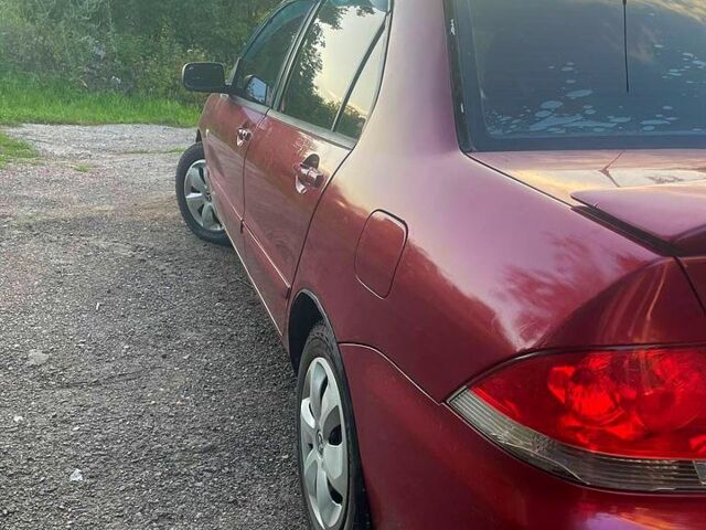 Червоний Міцубісі Lancer, об'ємом двигуна 1.6 л та пробігом 185 тис. км за 3900 $, фото 2 на Automoto.ua