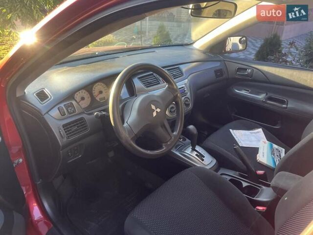 Красный Мицубиси Лансер, объемом двигателя 0 л и пробегом 282 тыс. км за 5200 $, фото 6 на Automoto.ua