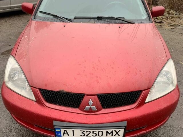 Червоний Міцубісі Lancer, об'ємом двигуна 1.6 л та пробігом 300 тис. км за 2799 $, фото 1 на Automoto.ua