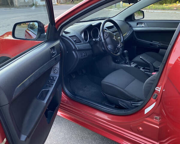 Червоний Міцубісі Lancer, об'ємом двигуна 2 л та пробігом 153 тис. км за 6700 $, фото 14 на Automoto.ua