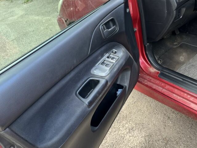 Красный Мицубиси Лансер, объемом двигателя 1.6 л и пробегом 3 тыс. км за 3000 $, фото 7 на Automoto.ua