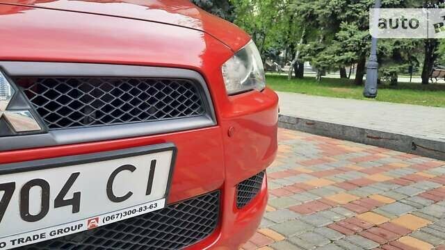 Червоний Міцубісі Lancer, об'ємом двигуна 1.5 л та пробігом 115 тис. км за 8155 $, фото 57 на Automoto.ua