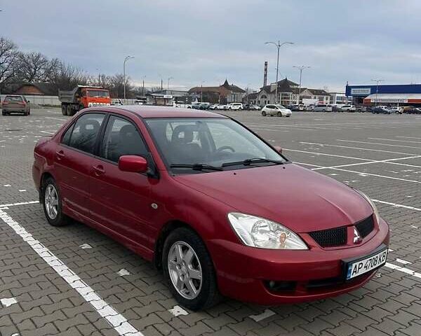 Красный Мицубиси Лансер, объемом двигателя 1.6 л и пробегом 176 тыс. км за 4300 $, фото 1 на Automoto.ua