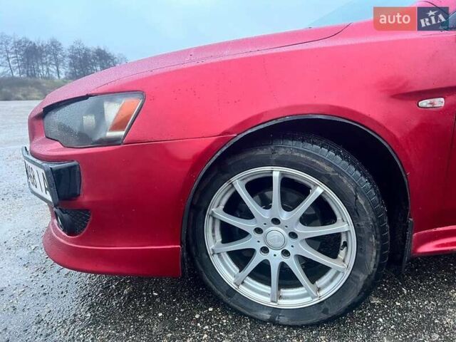 Красный Мицубиси Лансер, объемом двигателя 1.5 л и пробегом 241 тыс. км за 5850 $, фото 12 на Automoto.ua