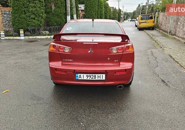 Червоний Міцубісі Lancer, об'ємом двигуна 2 л та пробігом 186 тис. км за 5600 $, фото 10 на Automoto.ua
