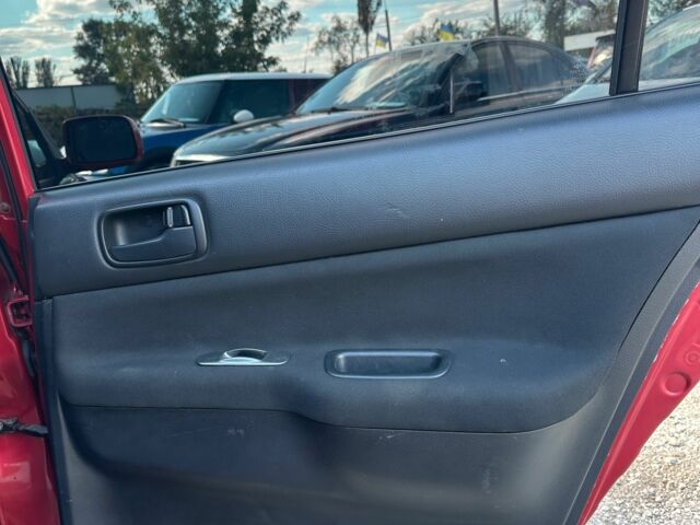 Красный Мицубиси Лансер, объемом двигателя 1.6 л и пробегом 230 тыс. км за 5300 $, фото 8 на Automoto.ua