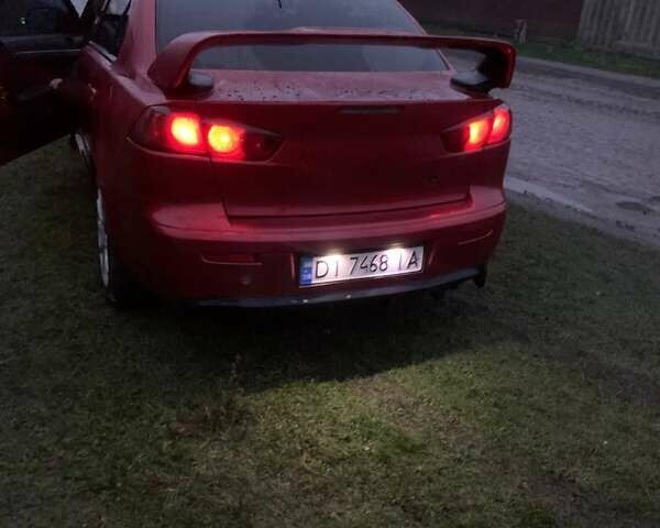 Красный Мицубиси Лансер, объемом двигателя 1.5 л и пробегом 241 тыс. км за 5850 $, фото 3 на Automoto.ua