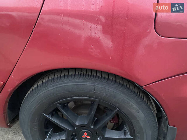 Красный Мицубиси Лансер, объемом двигателя 1.58 л и пробегом 269 тыс. км за 3899 $, фото 9 на Automoto.ua
