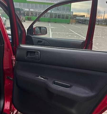 Красный Мицубиси Лансер, объемом двигателя 1.6 л и пробегом 176 тыс. км за 4300 $, фото 19 на Automoto.ua