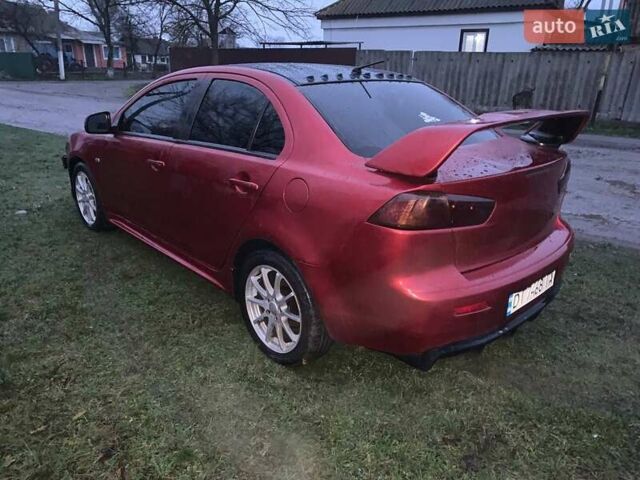 Красный Мицубиси Лансер, объемом двигателя 1.5 л и пробегом 241 тыс. км за 5850 $, фото 19 на Automoto.ua