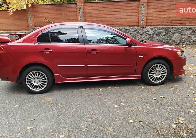 Червоний Міцубісі Lancer, об'ємом двигуна 2 л та пробігом 187 тис. км за 5500 $, фото 8 на Automoto.ua