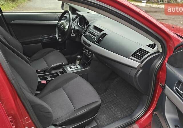 Червоний Міцубісі Lancer, об'ємом двигуна 2 л та пробігом 186 тис. км за 5600 $, фото 18 на Automoto.ua