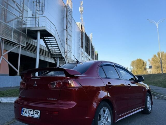 Красный Мицубиси Лансер, объемом двигателя 2 л и пробегом 307 тыс. км за 6499 $, фото 5 на Automoto.ua