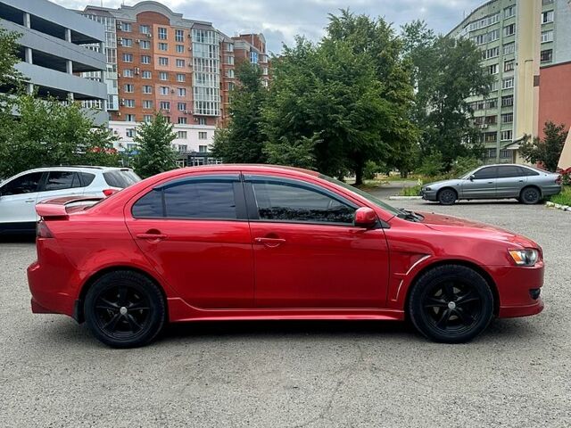 Червоний Міцубісі Lancer, об'ємом двигуна 2 л та пробігом 184 тис. км за 5999 $, фото 4 на Automoto.ua