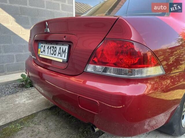 Красный Мицубиси Лансер, объемом двигателя 0 л и пробегом 282 тыс. км за 5200 $, фото 7 на Automoto.ua