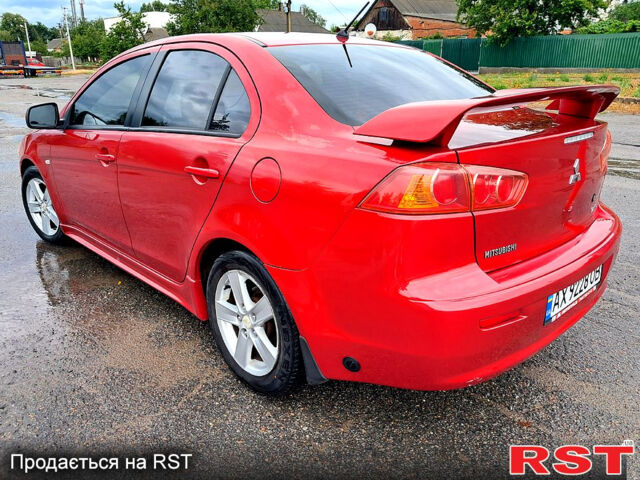 Червоний Міцубісі Lancer, об'ємом двигуна 2 л та пробігом 187 тис. км за 5000 $, фото 5 на Automoto.ua