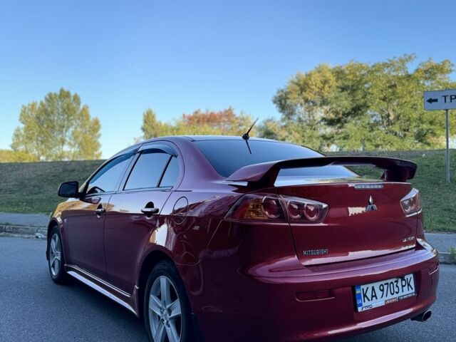Красный Мицубиси Лансер, объемом двигателя 2 л и пробегом 307 тыс. км за 6499 $, фото 4 на Automoto.ua