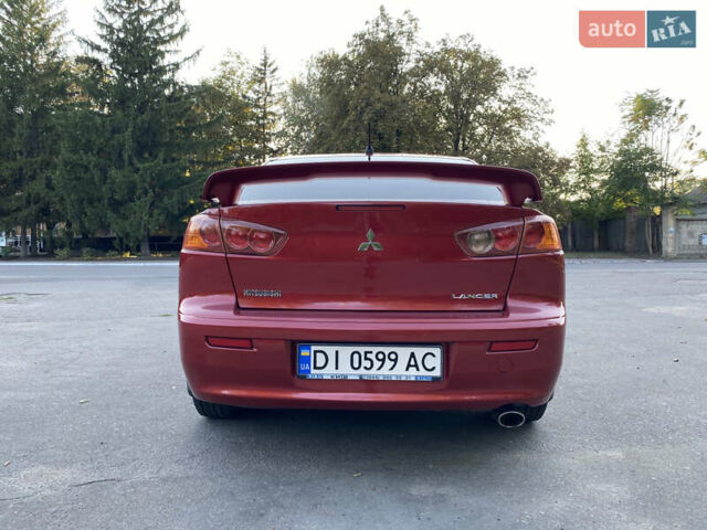 Червоний Міцубісі Lancer, об'ємом двигуна 2 л та пробігом 153 тис. км за 6700 $, фото 4 на Automoto.ua