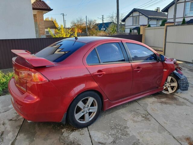 Красный Мицубиси Лансер, объемом двигателя 2 л и пробегом 406 тыс. км за 2750 $, фото 3 на Automoto.ua