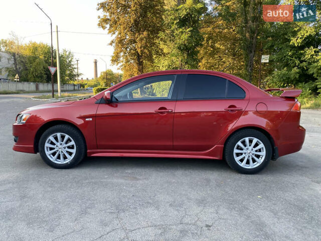 Червоний Міцубісі Lancer, об'ємом двигуна 2 л та пробігом 153 тис. км за 6700 $, фото 3 на Automoto.ua