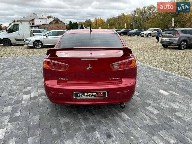 Червоний Міцубісі Lancer, об'ємом двигуна 2 л та пробігом 293 тис. км за 6399 $, фото 7 на Automoto.ua