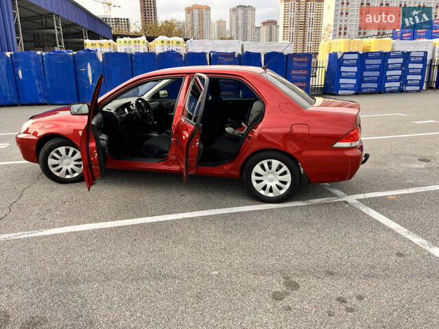 Червоний Міцубісі Lancer, об'ємом двигуна 1.6 л та пробігом 194 тис. км за 5500 $, фото 9 на Automoto.ua