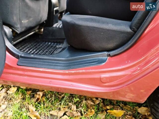 Красный Мицубиси Лансер, объемом двигателя 1.6 л и пробегом 214 тыс. км за 5000 $, фото 12 на Automoto.ua