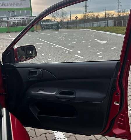 Красный Мицубиси Лансер, объемом двигателя 1.6 л и пробегом 176 тыс. км за 4300 $, фото 21 на Automoto.ua