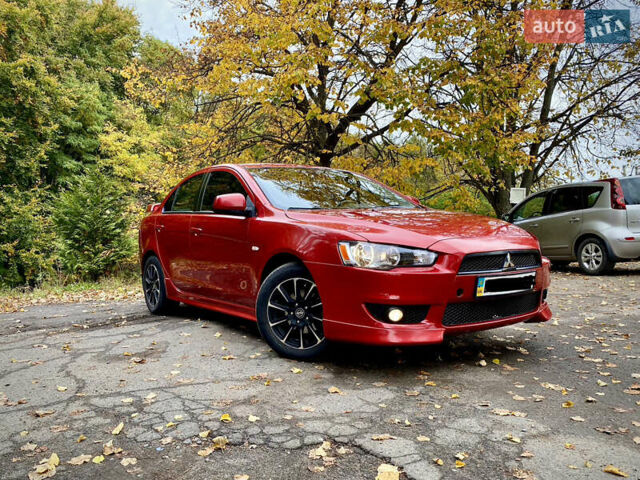 Червоний Міцубісі Lancer, об'ємом двигуна 2 л та пробігом 122 тис. км за 7200 $, фото 7 на Automoto.ua