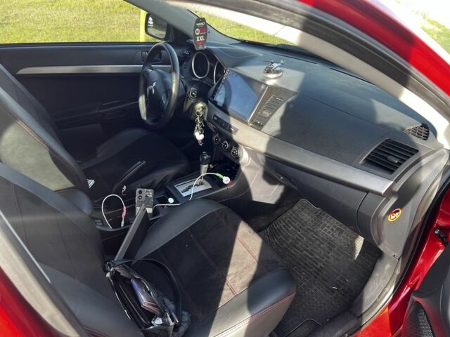 Мицубиси Лансер 2007 в Одессе на Automoto.ua Красный Мицубиси Лансер, объемом двигателя 1.5 л и пробегом 2 тыс. км за 6500 $, фото 5 на Automoto.ua