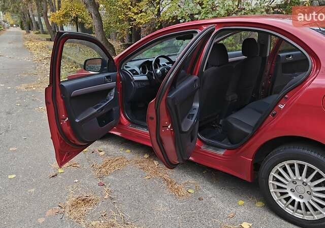 Міцубісі Lancer 2007 у Києві на Automoto.ua Червоний Міцубісі Lancer, об'ємом двигуна 2 л та пробігом 186 тис. км за 5600 $, фото 14 на Automoto.ua