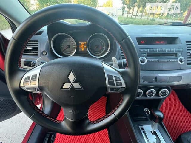 Червоний Міцубісі Lancer, об'ємом двигуна 2 л та пробігом 250 тис. км за 6500 $, фото 33 на Automoto.ua