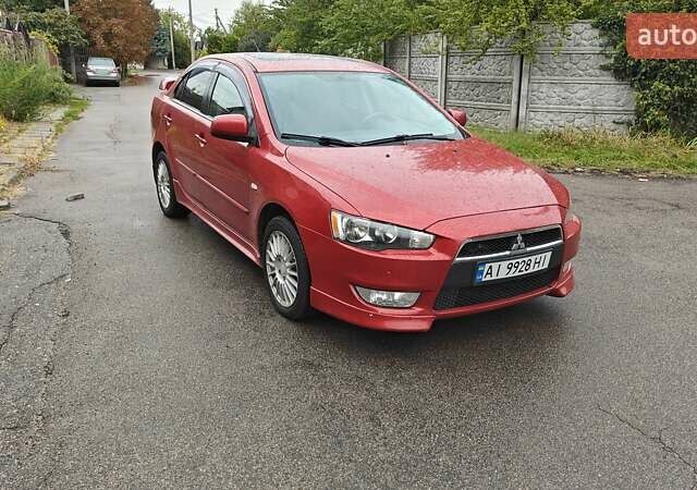 Червоний Міцубісі Lancer, об'ємом двигуна 2 л та пробігом 186 тис. км за 5600 $, фото 7 на Automoto.ua