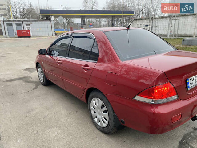 Червоний Міцубісі Lancer, об'ємом двигуна 1.58 л та пробігом 151 тис. км за 5600 $, фото 4 на Automoto.ua