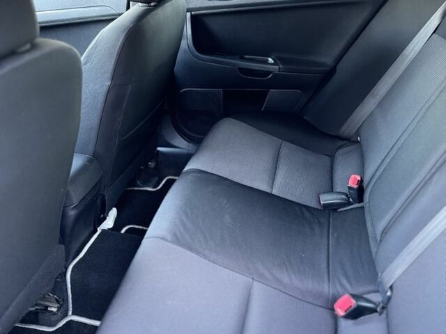 Красный Мицубиси Лансер, объемом двигателя 2 л и пробегом 307 тыс. км за 6499 $, фото 7 на Automoto.ua