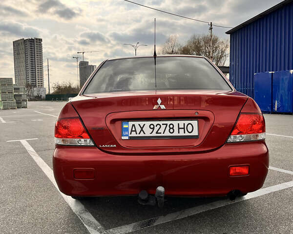 Червоний Міцубісі Lancer, об'ємом двигуна 1.6 л та пробігом 194 тис. км за 5500 $, фото 3 на Automoto.ua