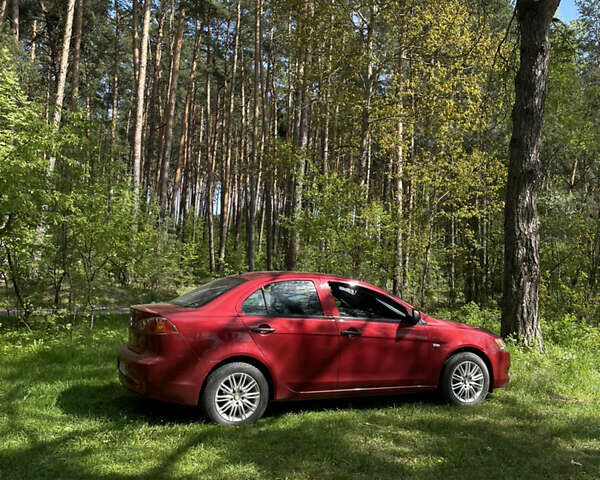 Червоний Міцубісі Lancer, об'ємом двигуна 1.5 л та пробігом 214 тис. км за 6150 $, фото 12 на Automoto.ua