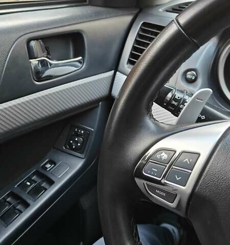 Міцубісі Lancer 2007 у Києві на Automoto.ua Червоний Міцубісі Lancer, об'ємом двигуна 2 л та пробігом 186 тис. км за 5600 $, фото 19 на Automoto.ua