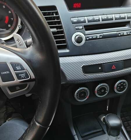 Міцубісі Lancer 2007 у Києві на Automoto.ua Червоний Міцубісі Lancer, об'ємом двигуна 2 л та пробігом 186 тис. км за 5600 $, фото 18 на Automoto.ua