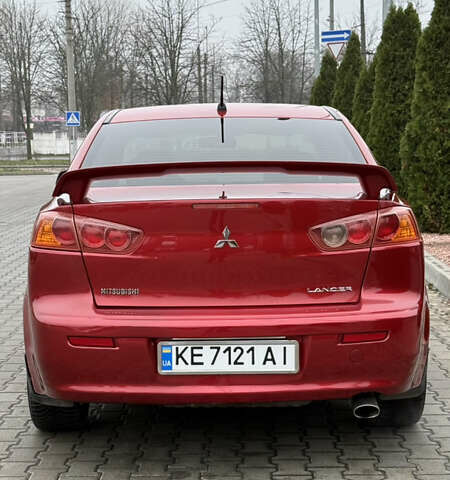 Красный Мицубиси Лансер, объемом двигателя 2 л и пробегом 261 тыс. км за 7200 $, фото 6 на Automoto.ua