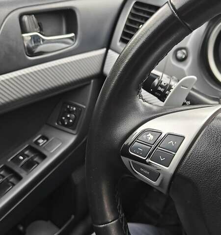 Червоний Міцубісі Lancer, об'ємом двигуна 2 л та пробігом 187 тис. км за 5600 $, фото 16 на Automoto.ua